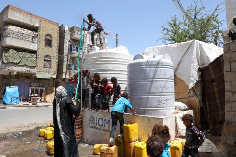 Children enjoy the refreshing water, provided by the newly renovated Al Dhabo’ah well in Ta’iz.